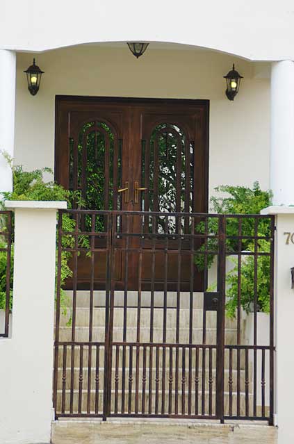 Photo Example of a modern decorative metal door in brown color finish