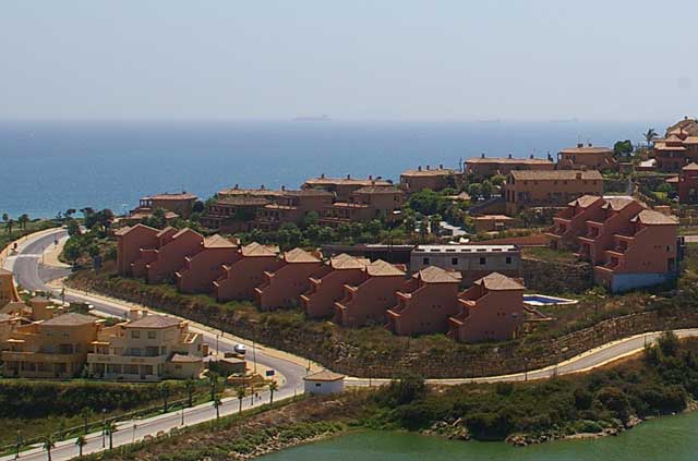 Photo of a modern urbanization in southern Spain with terrace style homes and a great view to the Mediterranean sea