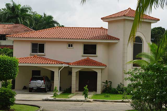 Photo of a modern 2 story town house painted in a light beige